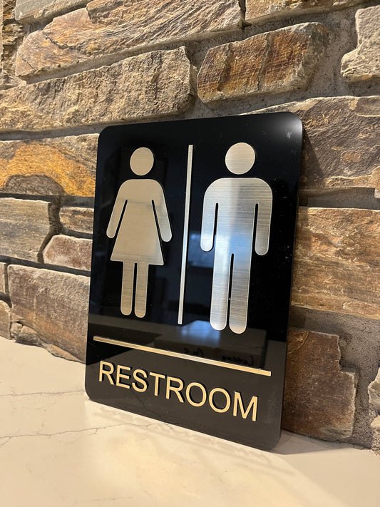 'Essentials Plus' Restroom Sign